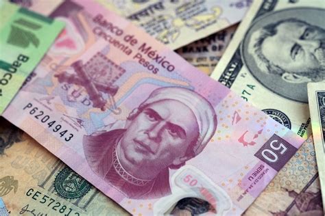 50 pesos to usd